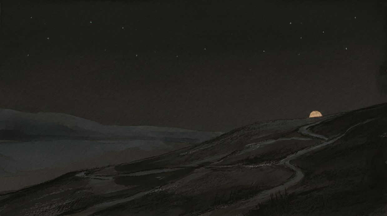 Photograph of a hillside above a hazy lake, worn paths crossing the slope