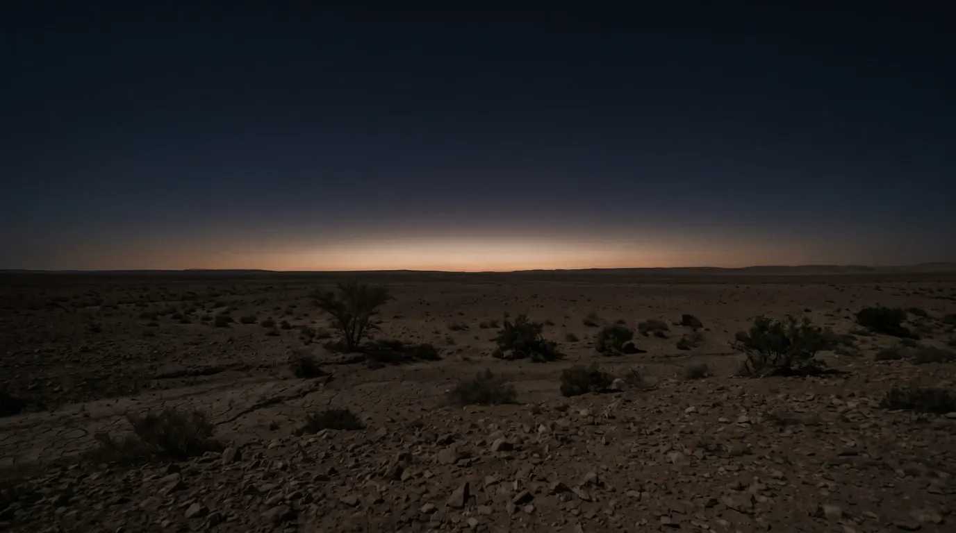An unbroken horizon over a wide, open land.